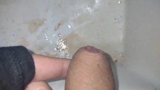 Very close up  ( pee hole releasing pee