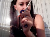 Dominatrix Nika smokes cigarettes sexually. Smoking fetish. Smell my smoke!
