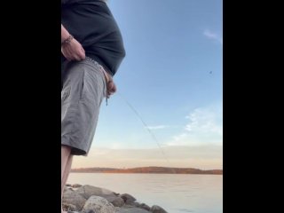 Pissing on the StLawerence river bank