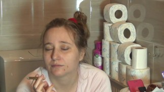 Smoking and drinking coffee in the morning, in the toilet
