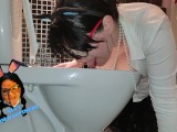 HUMAN TOILET MILF Slut with big tits licks the toilet bowl.