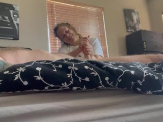 She likes me to kiss her feet while she strokes my cock