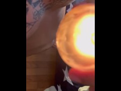 tattooed guy plays with candle wax while jerking off