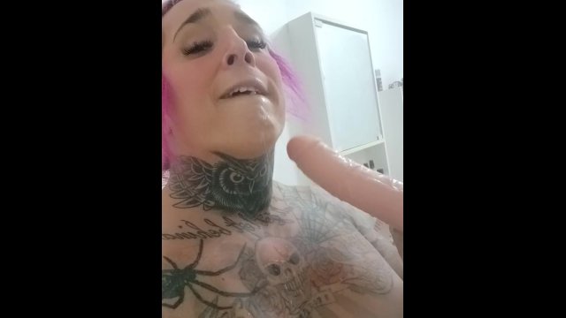 Shemale gag on huge dildo in the shower