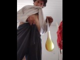 Filling a condom with piss video tape on old house