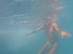 Topless in a public pool - milf's tasty naturals underwater