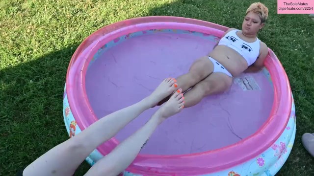 TSM - Dylan and Rhea pose in a pool