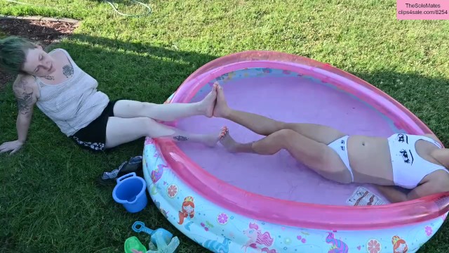 TSM - Dylan and Rhea pose in a pool