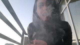 Smoking fetish from sexy Dominatrix Nika. Pretty woman blows cigarette smoke in your face