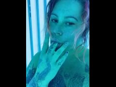 Freckled short pawn with white girl dreads has fun alone in the tanning bed