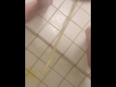 Close up piss before shower