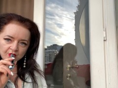 Vaping from sexy Mistress Lara in a nightie