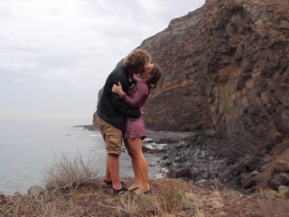 Hot Couple Kissing Passionately above a Secret Rocky Beach