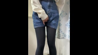 Peeing in a denim mini-skirt