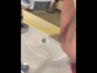 Pissing On Sink