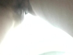 Girl pisses in the toilet at a gas station and shows a pad