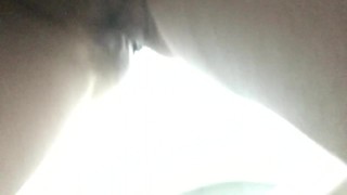 Girl pisses in the toilet at a gas station and shows a pad