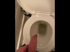 Peeing with a hard cock