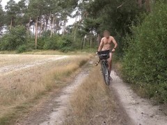 Ride naked on a bicycle near a military shooting range