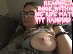 Caught this MILF reading a book with one BIG RIPE TIT hanging out
