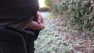 Pissing at work in a cold field