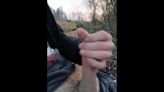 Cumshot outside on a bench in nature
