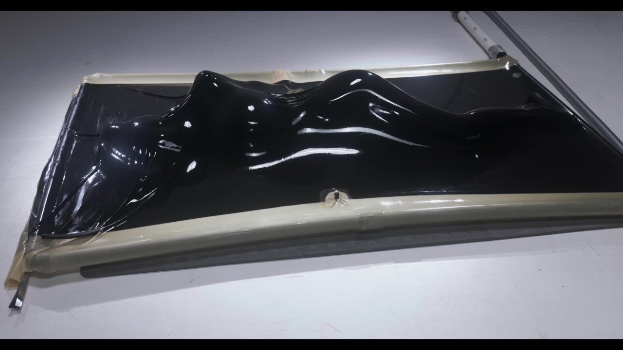 needy slut tries multiple positions in latex vacbed