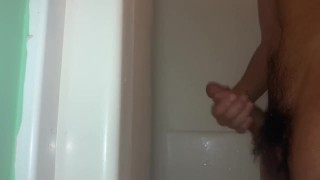 College student in the shower