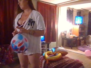 Shy Busty Brunette Popping Balloons for Fans