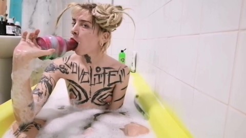 Sloppy slut takes huge doorstop toy in her mouth and goons drooling bathtub alt wet huge toy gagging