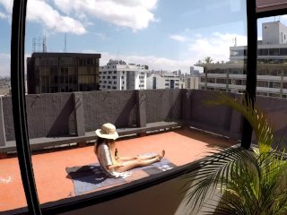 She is sunbathing in a micro bikini