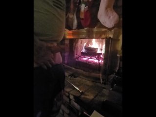 Jerking off next to a warm fire