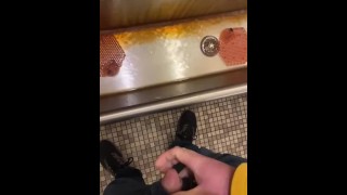 Taking a piss at an old urinal trough