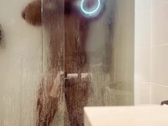 Muscular hunk shows body in the shower