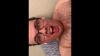 Shooting a creamy load while watching gay porn