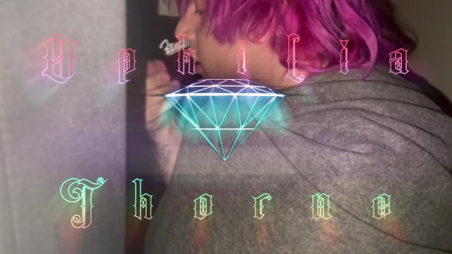 Trans WHORE Ophilia Thorne sucks HUGE stranger cock through gloryhole while cuckold husband listens
