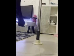 Mistress in high heels pole dance