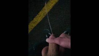 Pissing in crowded parking lot