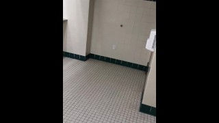 Showing off in public bathroom at school