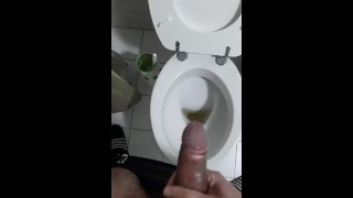 a big uncut cock peeing