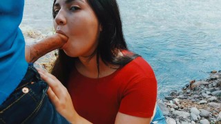 Risky passionate blowjob in nature outdoors.