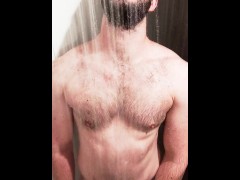 Bearded muscle jock jerks off and gets wet in the gym showers