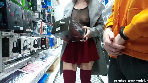 public flashing in an electronics store, embarrassing the consultant