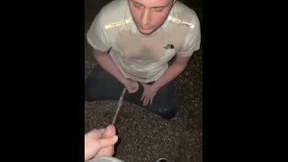 Pissing on a man