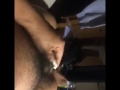 Pissing on a green tea soda bottle then show off my brown little dick