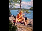 Preview 1 of Blond Finnish MILF masturbating outdoors in public view, caught by passing boaters