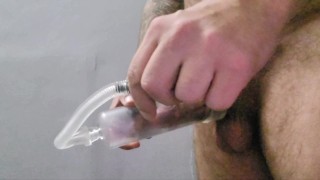 Slow Mo pulling fat pumped cock from the tube