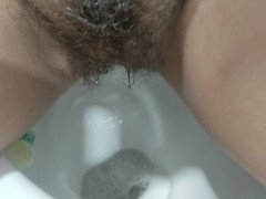 Look at my hairy pussy while I'm pee