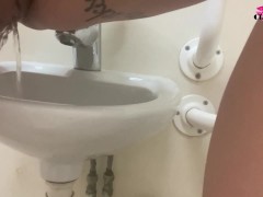 Classy Filth pisses in a public sink