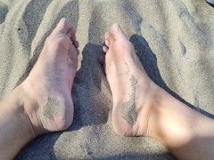 Chelsea K- Playing with my feets in the sand, look at my bare soles